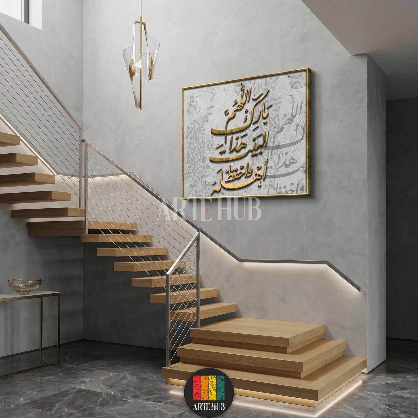 A luxurious 3D gold Arabic calligraphy canvas art piece with religious script, hanging in a modern minimalist staircase setting in Egypt.