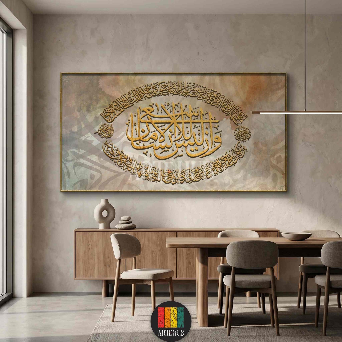 Large framed canvas wall art featuring intricate golden Arabic calligraphy on a neutral textured background, styled in a modern minimalist dining room in Egypt.