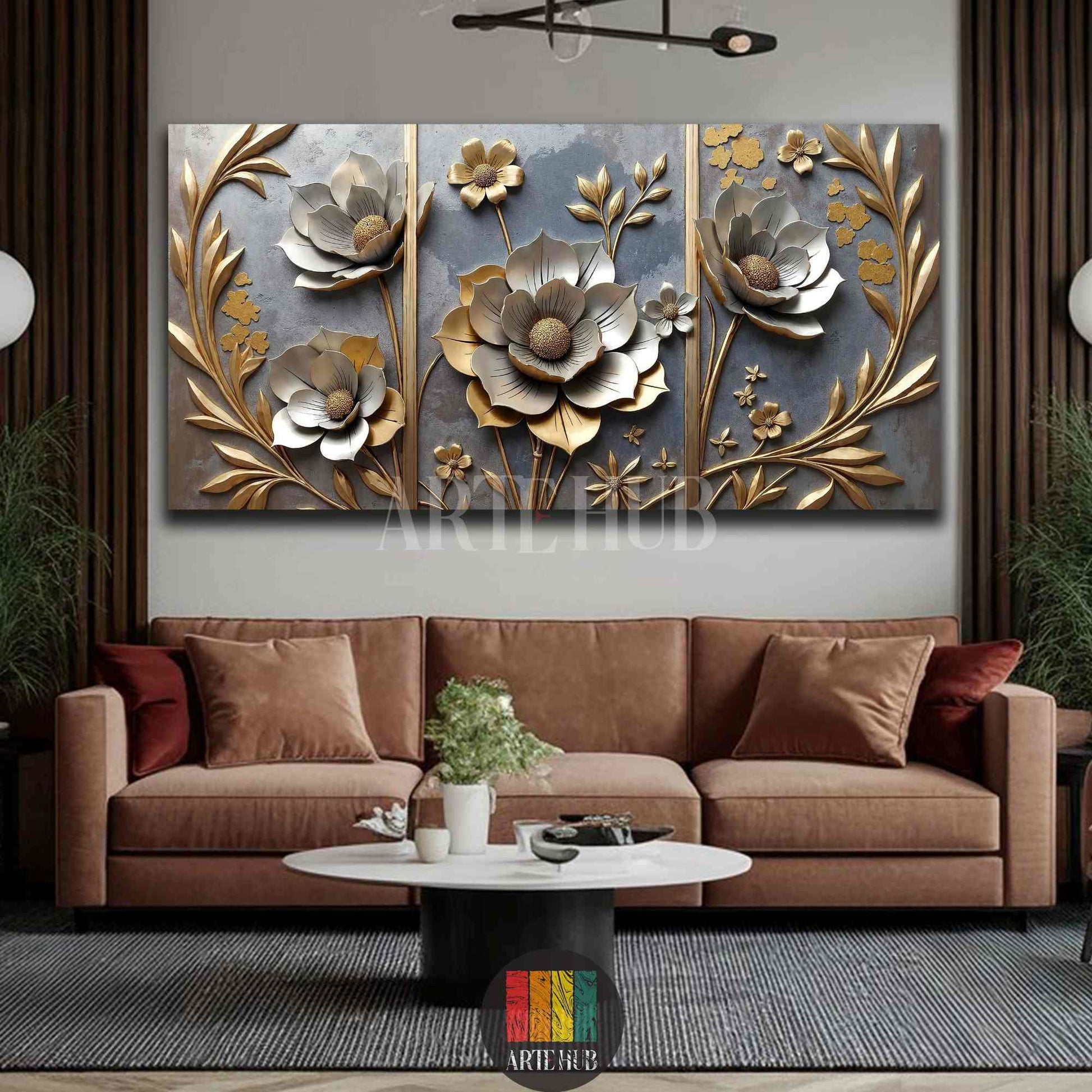 Elegant 3D-effect canvas wall art with gold and silver flowers on a textured grey background, styled over a brown sofa in a contemporary Egyptian home.