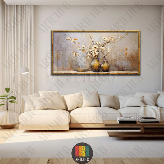 A premium horizontal canvas wall art featuring elegant white flowers in golden vases with a textured abstract background in a modern living room setting.