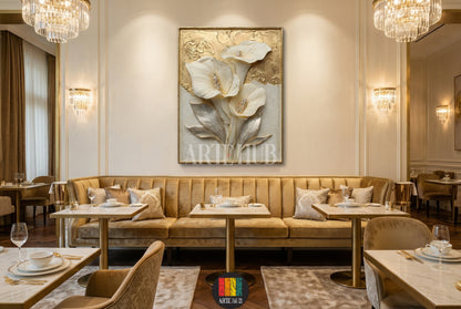 A large framed canvas wall art featuring three elegant white calla lilies with golden textured accents, styled in a luxurious Egyptian dining room.