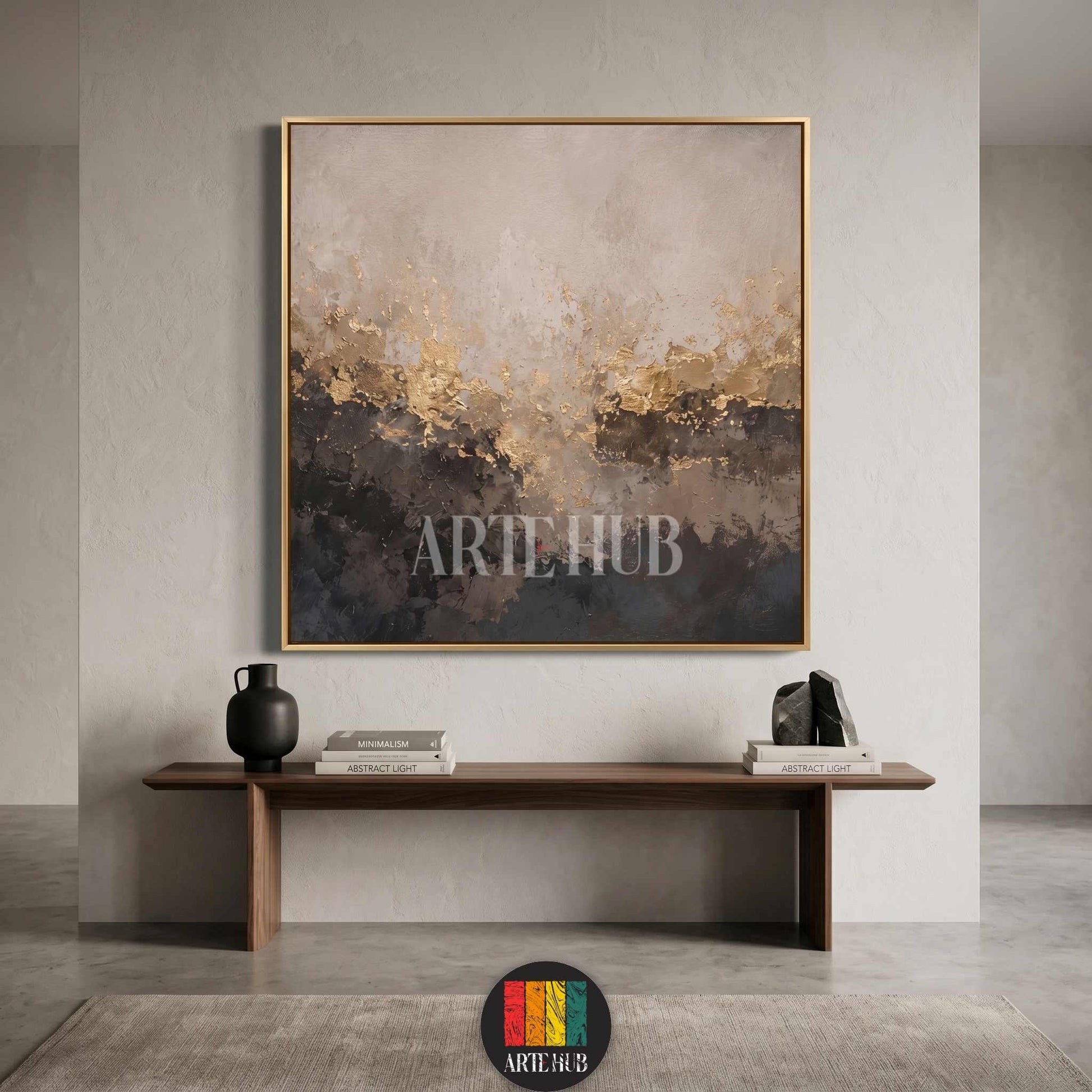 A square abstract canvas wall art featuring textured grey, black, and gold leaf elements in a premium gold frame, perfect for modern home decor in Egypt.
