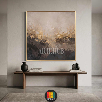 A square abstract canvas wall art featuring textured grey, black, and gold leaf elements in a premium gold frame, perfect for modern home decor in Egypt.
