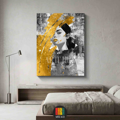 Modern canvas wall art featuring a grayscale woman's portrait with expressive gold paint strokes, ideal for luxury home decor in Egypt.