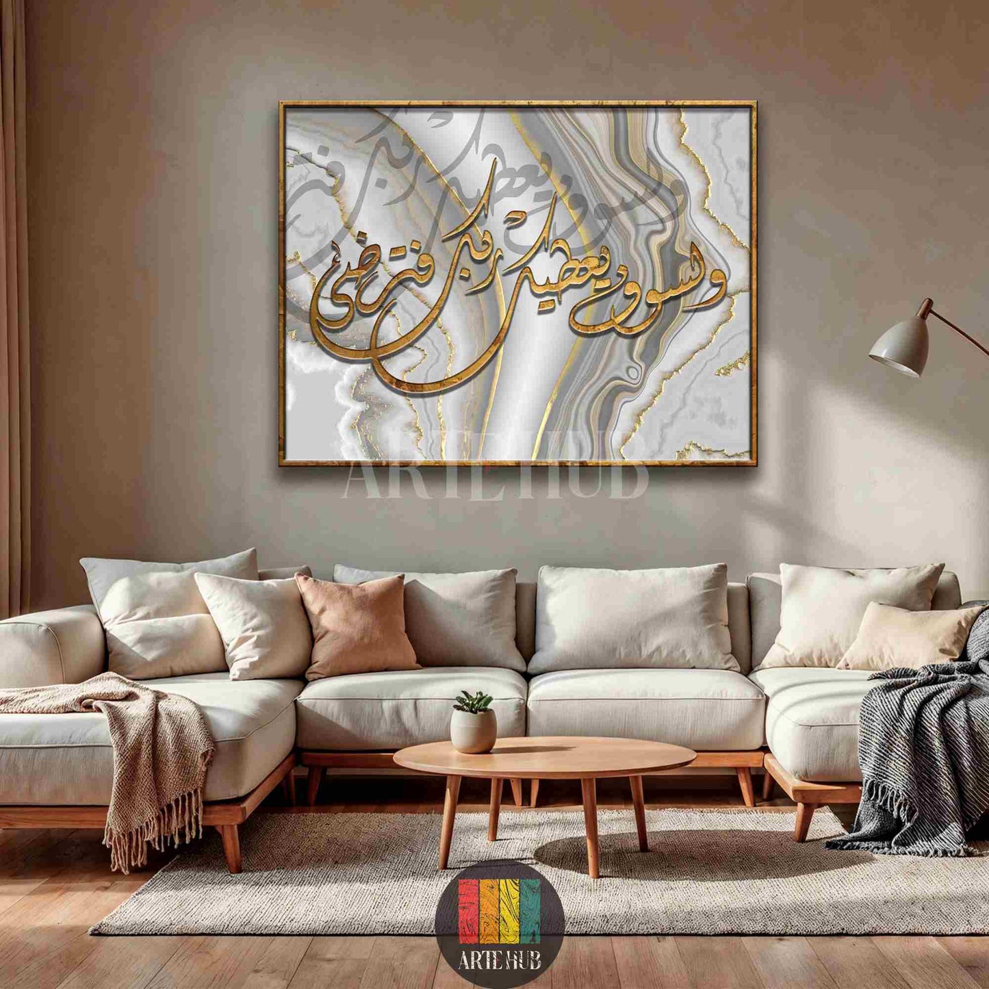 Elegant gold Arabic calligraphy on a white and grey marble texture background with gold veins, framed canvas wall art in a modern living room.
