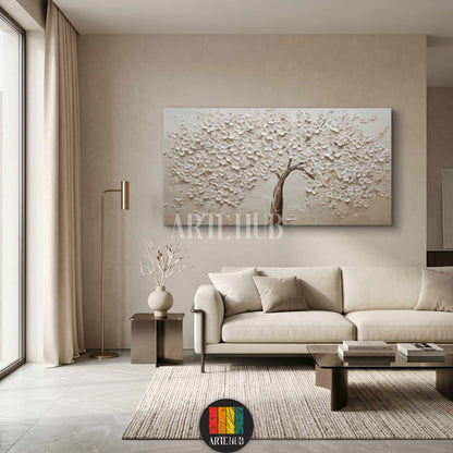 Textured white blossom tree canvas wall art with 3D floral details for a luxury modern living room in Egypt.