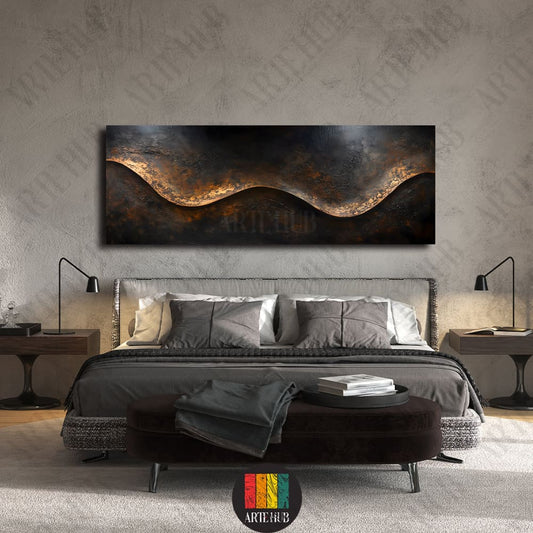 A premium horizontal abstract canvas wall art with metallic gold textures and a central blue accent over a dark moody background, styled in a luxury bedroom.