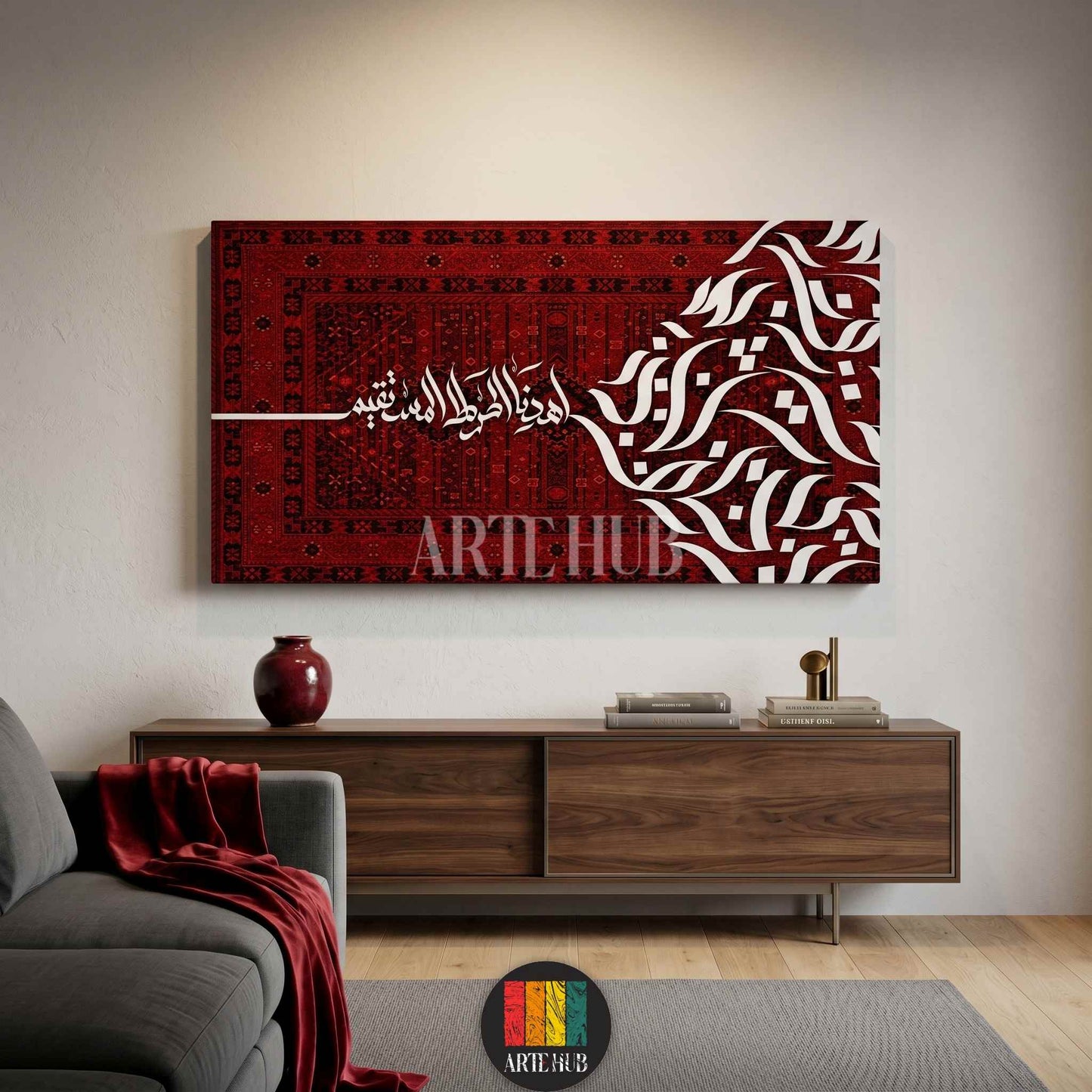 A luxury horizontal canvas wall art featuring elegant white Arabic calligraphy over a rich red traditional carpet pattern background in a modern room.