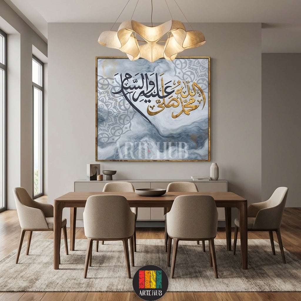 A large square canvas wall art featuring intricate Arabic calligraphy in gold and black over a gray marble background, styled in a luxury modern dining room.