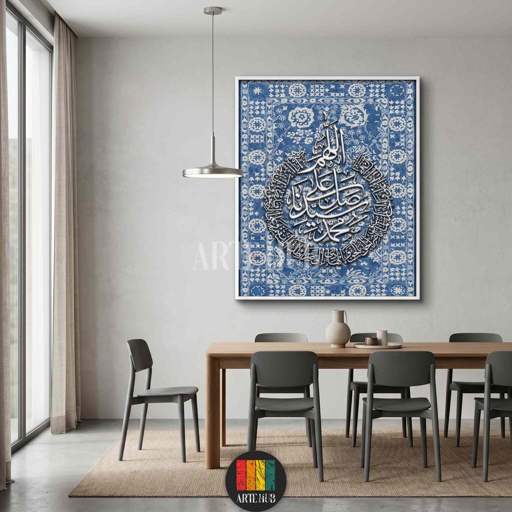 Modern Arabic calligraphy wall art featuring white script over a blue tapestry pattern, luxury home decor in Egypt.