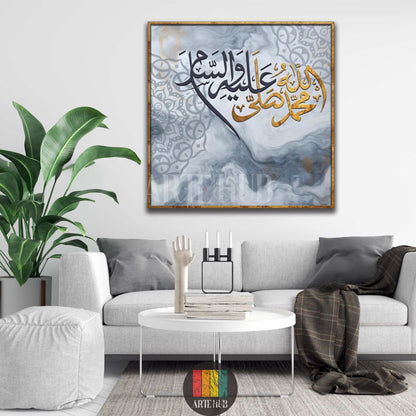 Modern gold Arabic calligraphy on a grey marble background canvas wall art in a stylish living room setting.