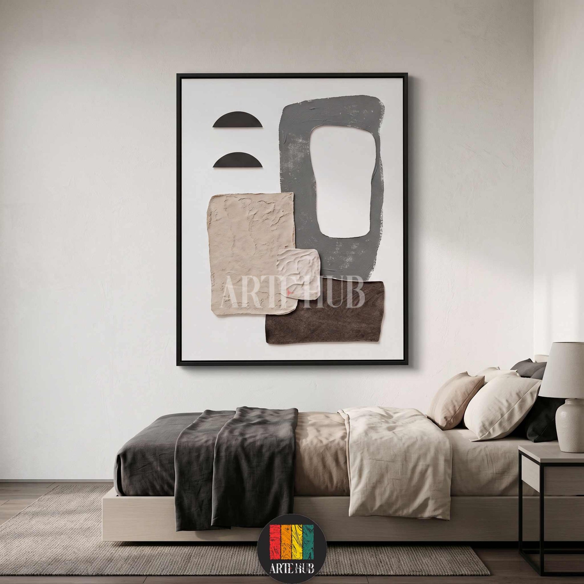 Abstract textured canvas wall art with grey and beige geometric shapes in a modern black frame for luxury bedroom decor in Egypt.