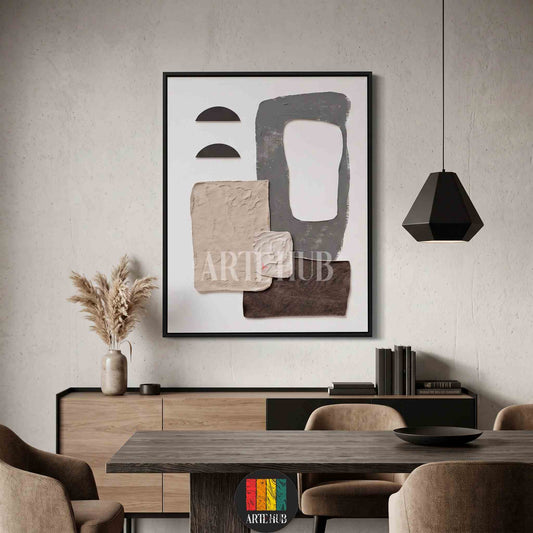 Minimalist framed canvas wall art featuring textured abstract shapes in neutral earth tones, displayed in a modern dining room setting in Egypt.