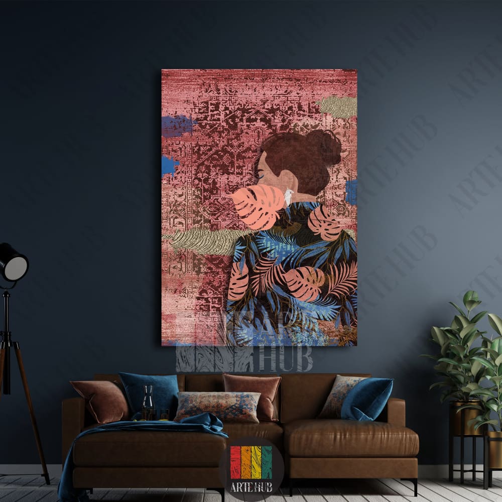A modern artistic canvas wall art depicting a woman in profile wearing a tropical leaf print garment against a rich red Persian carpet textured background.