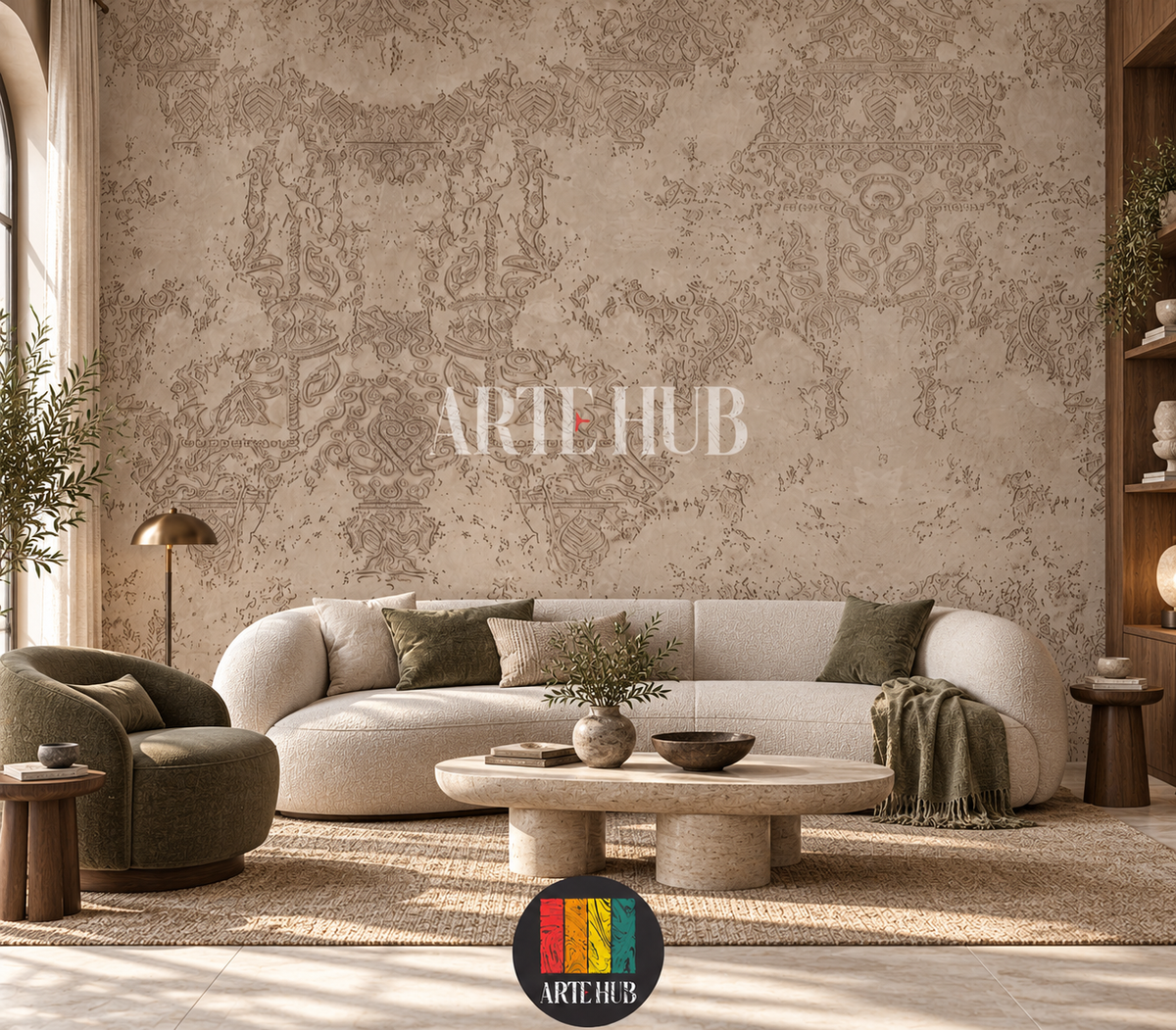 Patina Arabesque beige concrete-effect wallpaper with distressed ornamental motifs above a cream sofa.
room: living room