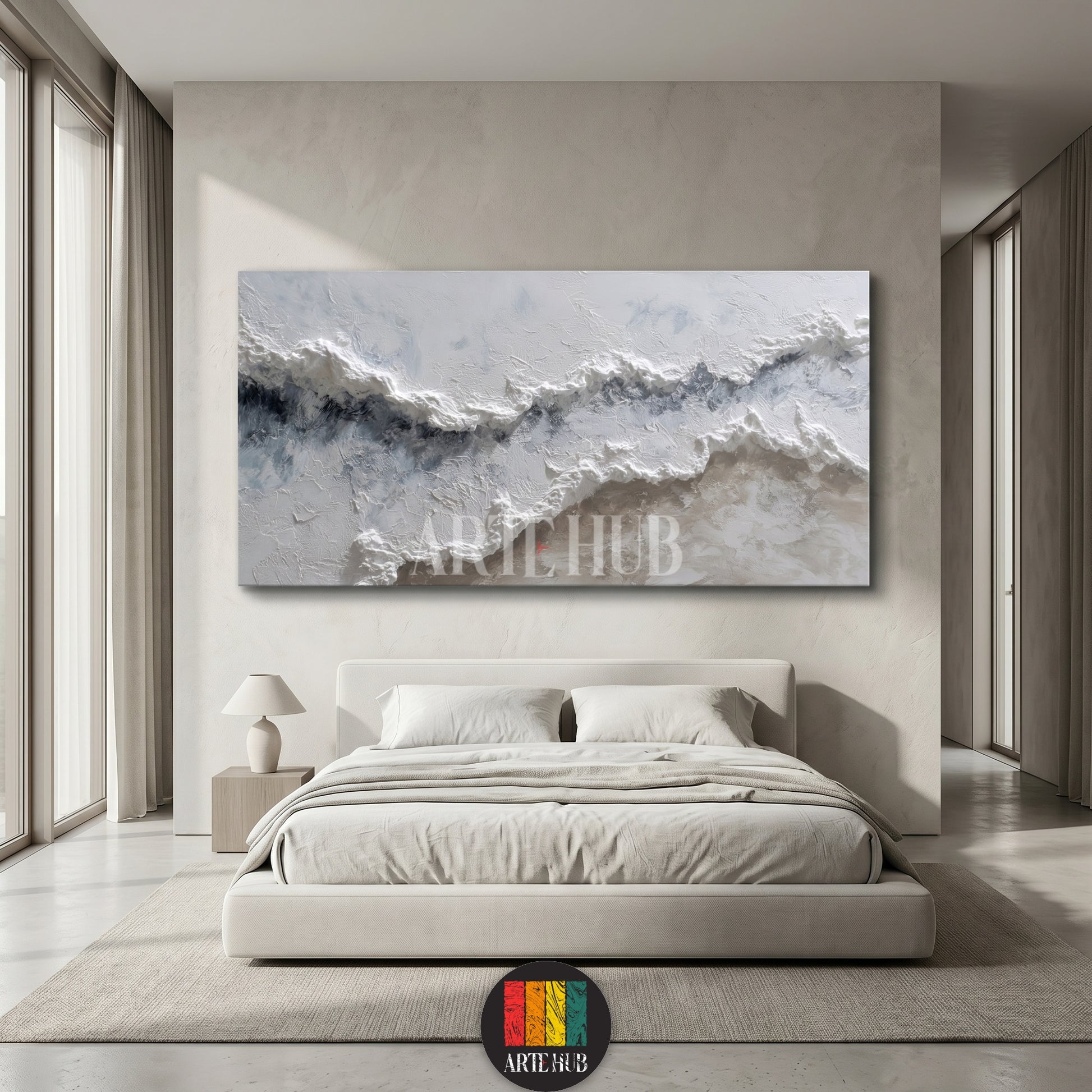 A large, textured 3D canvas wall art featuring white and blue abstract ocean waves hanging above a minimalist beige bed in a luxury Egyptian home.