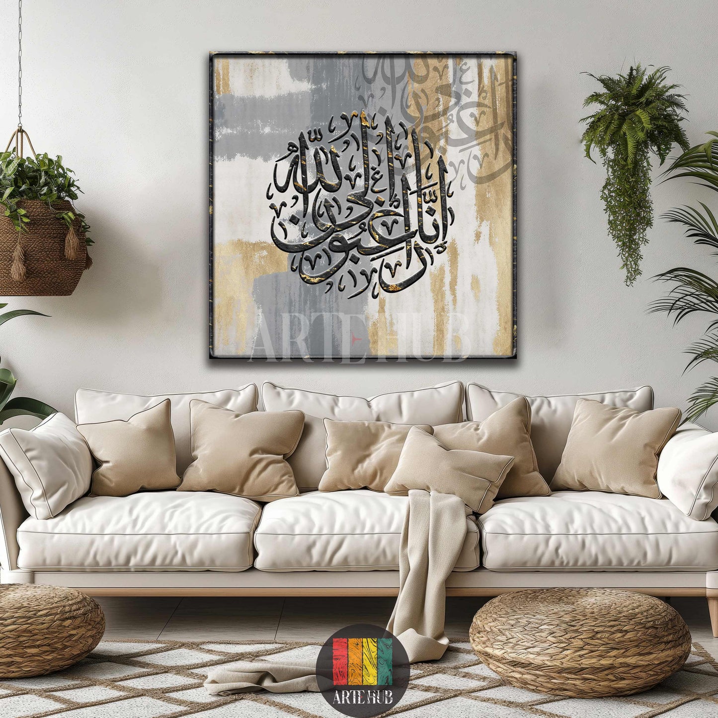 Elegant Islamic calligraphy canvas art featuring black and gold Arabic script on an abstract grey and gold background, hanging above a white sofa with beige cushions in a stylish Egyptian living room.
تابلوه فني بخط عربي إسلامي أسود وذهبي على خلفية رمادية وذهبية مجردة، معلق فوق أريكة بيضاء بمساند بيج في غرفة معيشة عصرية في مصر.